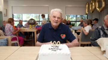Reg Symons celebrates his 100th birthday at St Basil's Miranda. Picture by Chris Lane