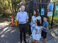 Simon Kennedy with his wife Nila and children, Taj, 8, and Kaia, 6 at a voting centre on Saturday before the Bondi Junction events occurred. Picture supplied